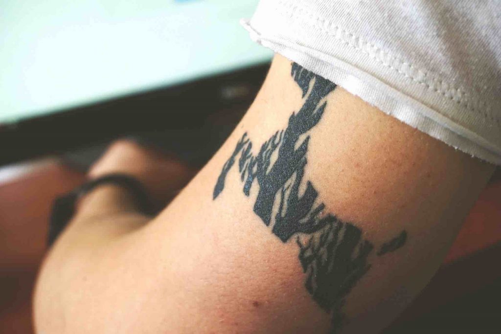 Picture of a person with a tattoo on his arm